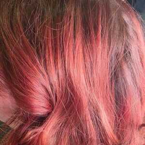 Warm copper color and curl finish by Sashia Hunter
